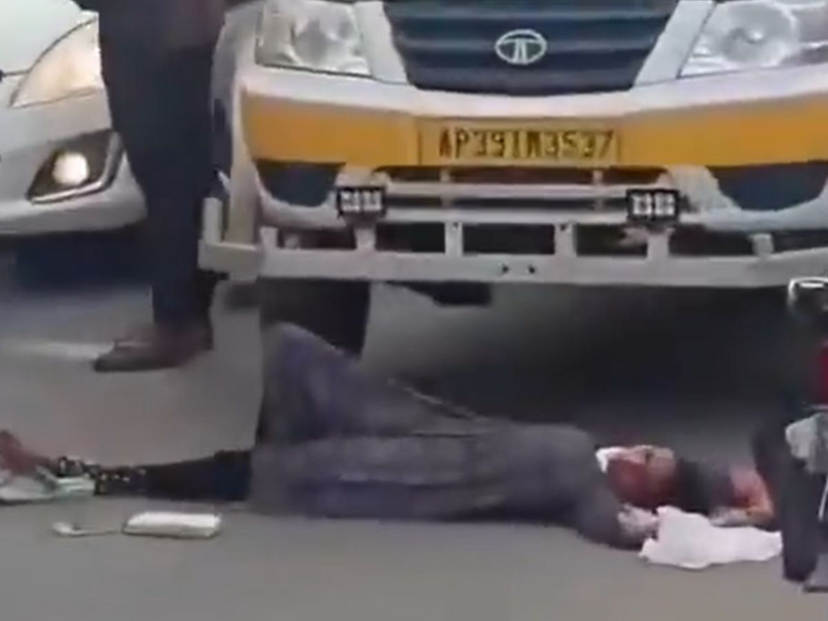 A young woman is seen making a commotion while drunk in Bhimavaram