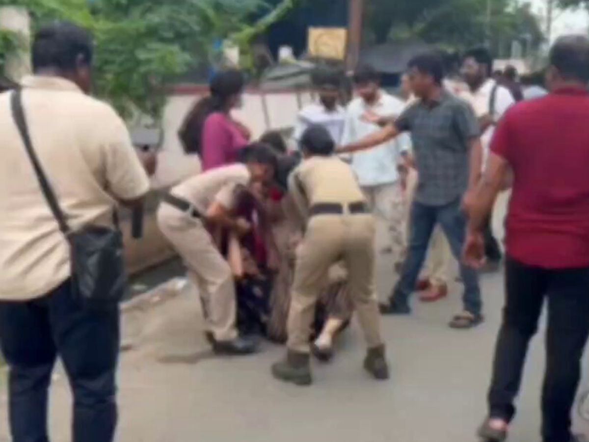 Vijayawada - Police drag away protesting medico students at NTR University