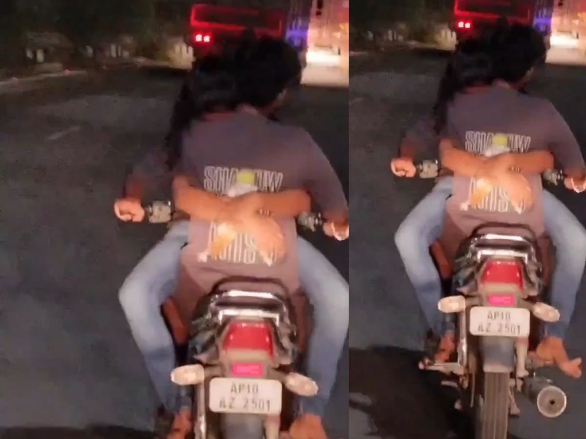 Hyderabad - Couple riding bikes on the Aranghar flyover for romance
