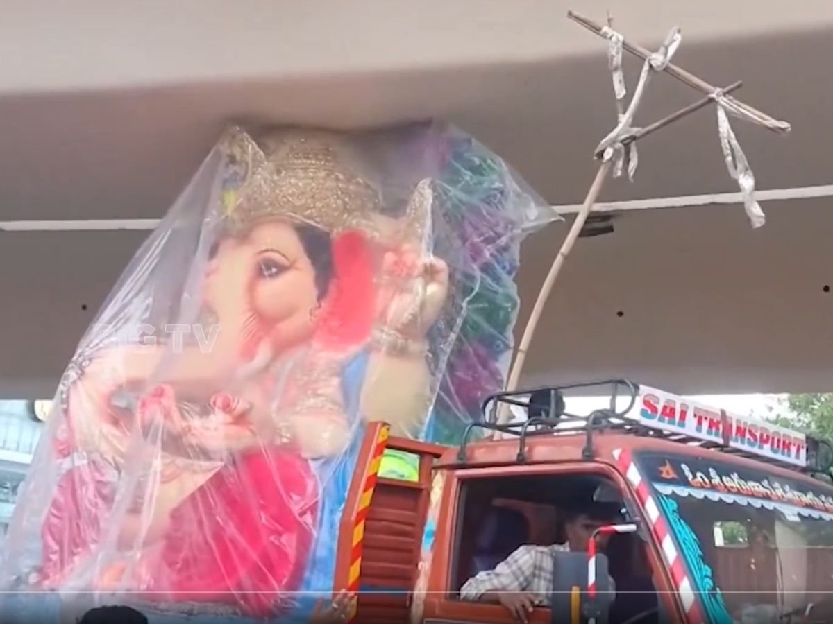 Ganesh's lorry stuck under flyover