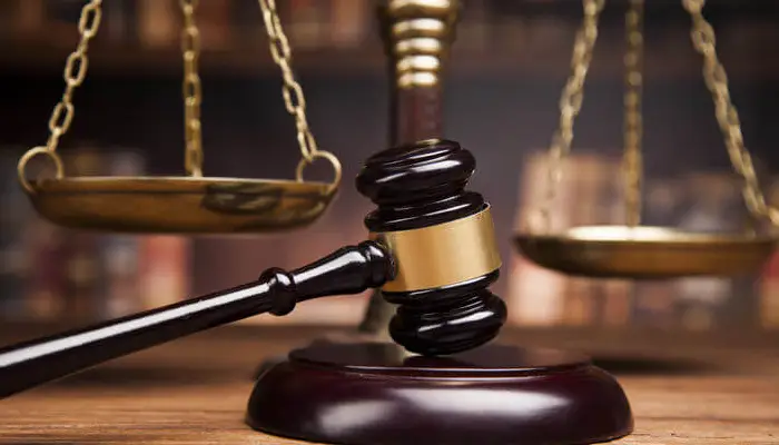 Grabbing a woman by the arm is not a crime said High Court