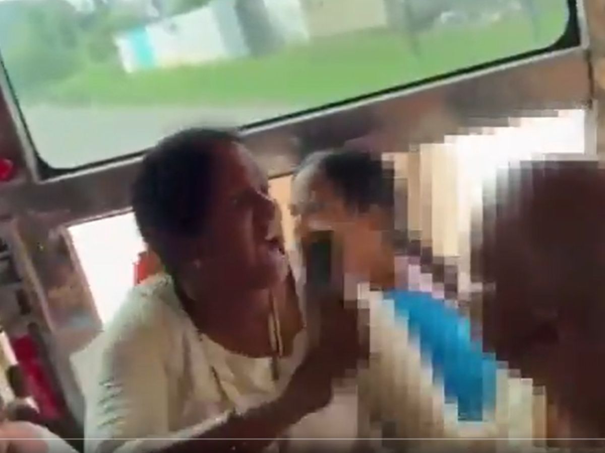 A woman was scolded by a man for sitting in the seat she had reserved in an AP RTC bus, who was furious with her