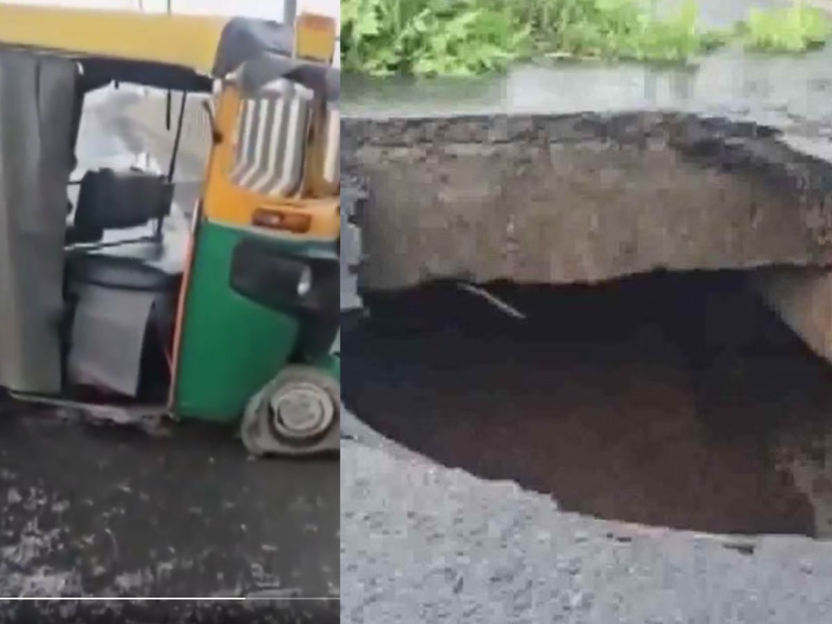 Auto stuck in a pothole on a flyover due to rains in Delhi